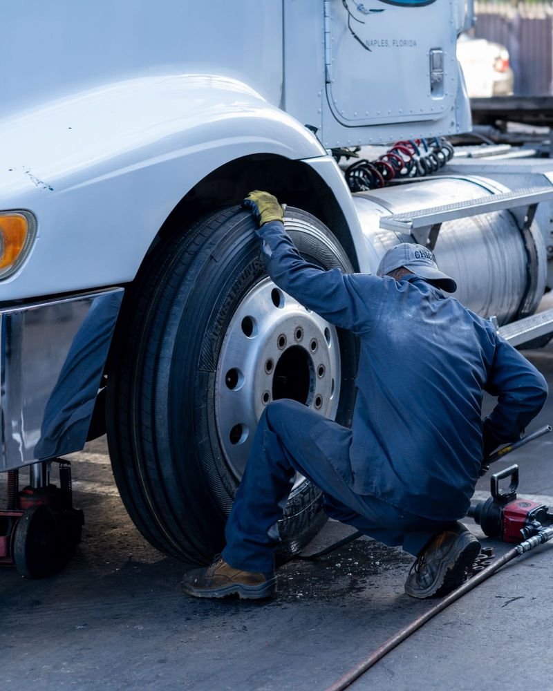 Alex Truck Tire technician replacing a steer tire on a semi-truck