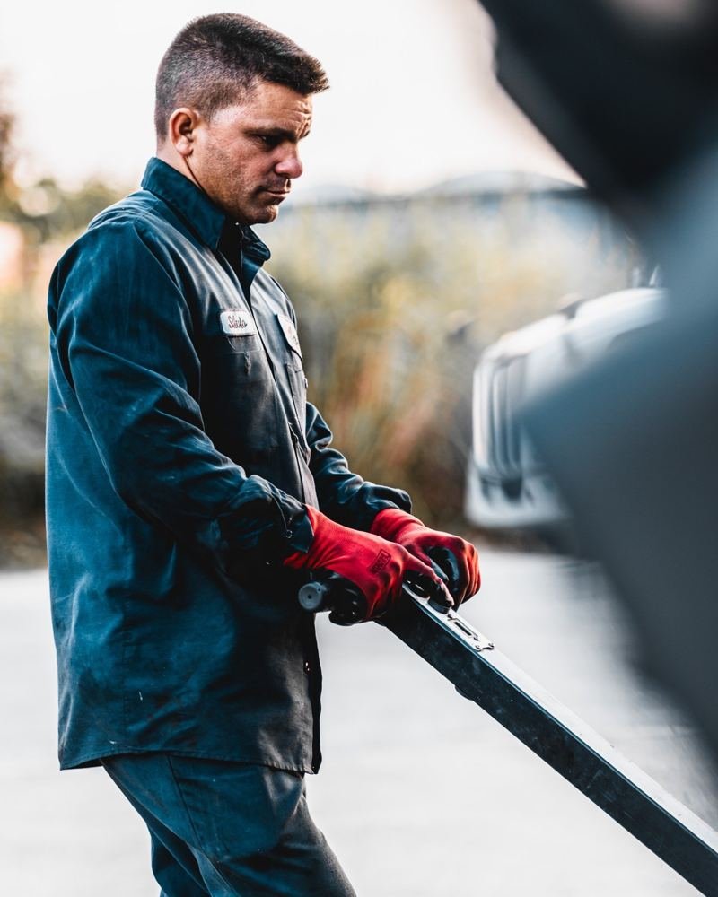 Technician mounting a truck tire