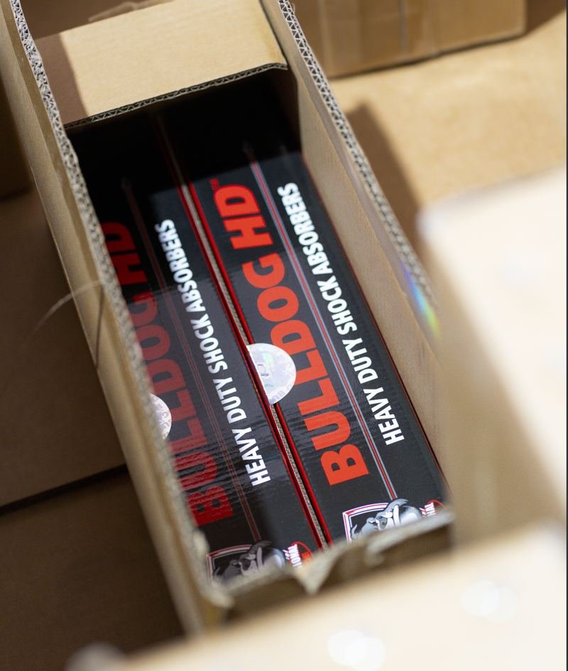 Bulldog HD heavy-duty shock absorbers boxed in the Alex Truck Tire warehouse